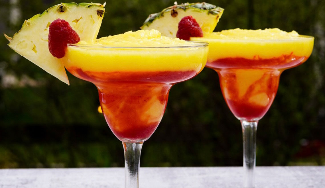 Raspberry Swirled Pineapple & Mango Frozen Margarita | Bjorn Bites & Booze | Wild West Viking